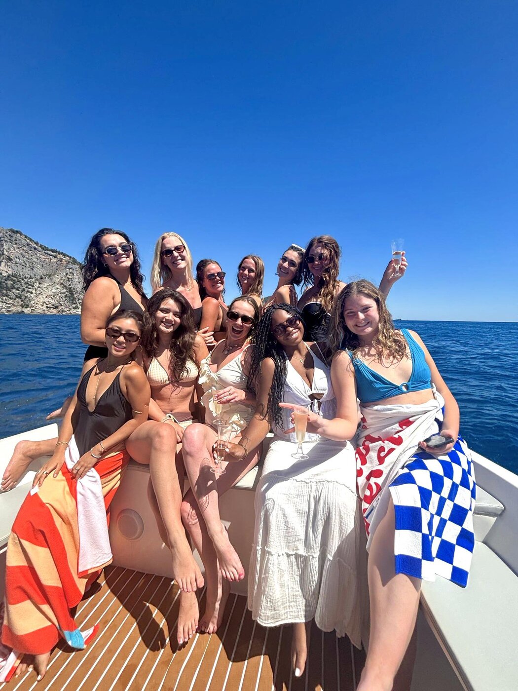 The whole group posing together on the boat