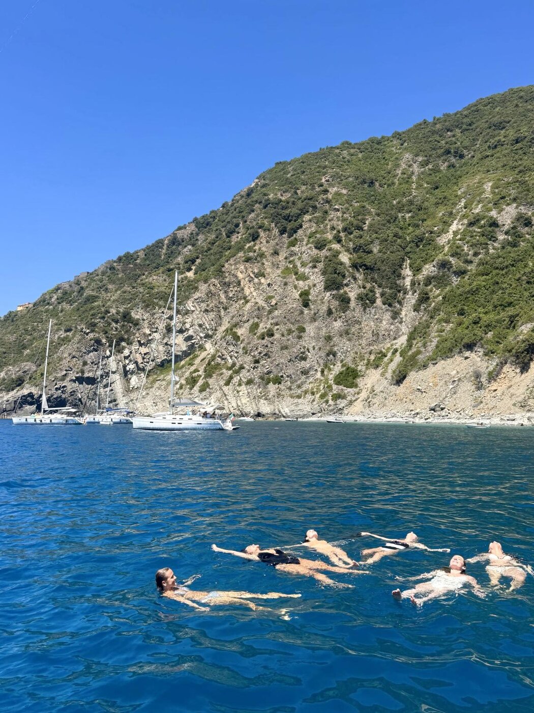 The group floating in the water at the swim spot