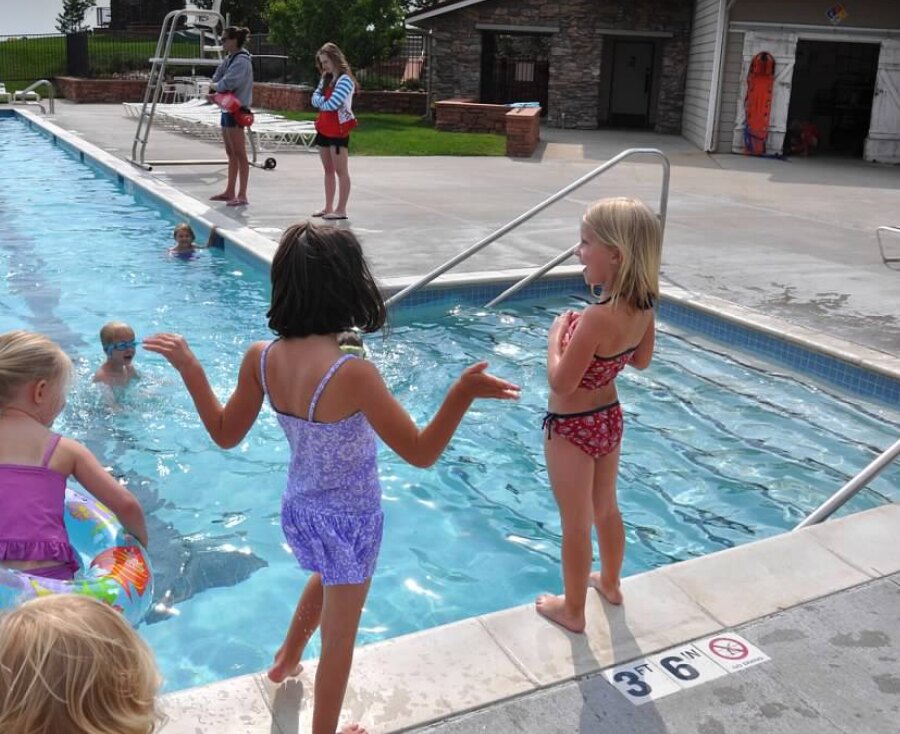 Kids at the pool in the summer