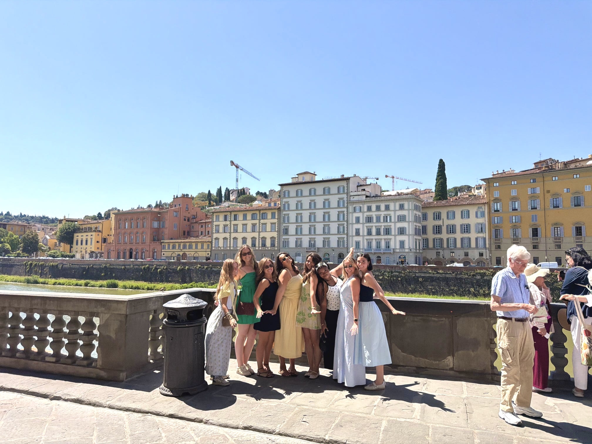 The whole group posing on a bridge over the Arno in Florence